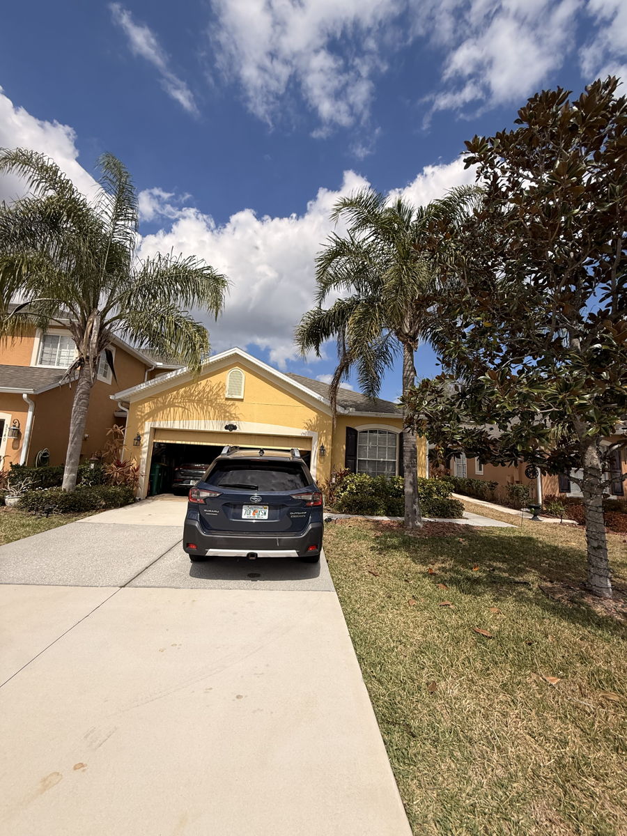 Tired Central Florida house exterior we would buy as-is